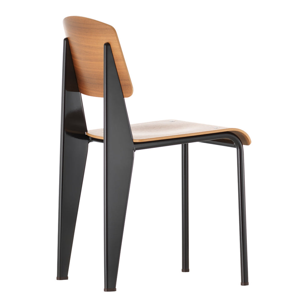 Sedia standard con tubo d'acciaio estetico ingegneristico e legno massello con design strutturale di Jean Prouvé per sala da pranzo