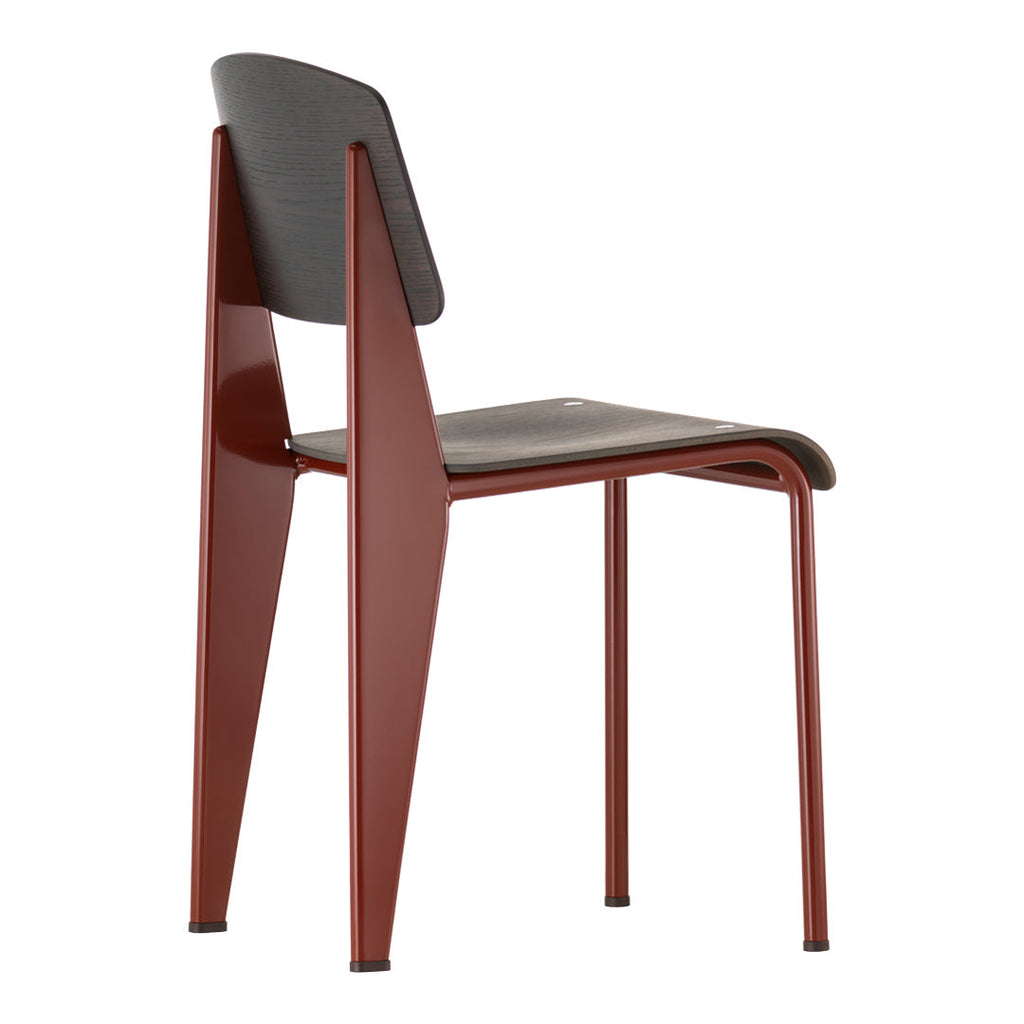 Sedia standard con tubo d'acciaio estetico ingegneristico e legno massello con design strutturale di Jean Prouvé per sala da pranzo