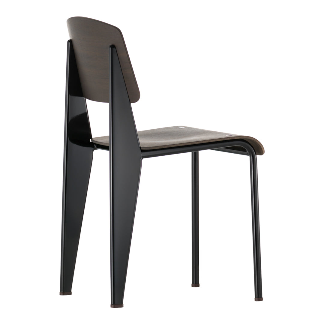 Sedia standard con tubo d'acciaio estetico ingegneristico e legno massello con design strutturale di Jean Prouvé per sala da pranzo