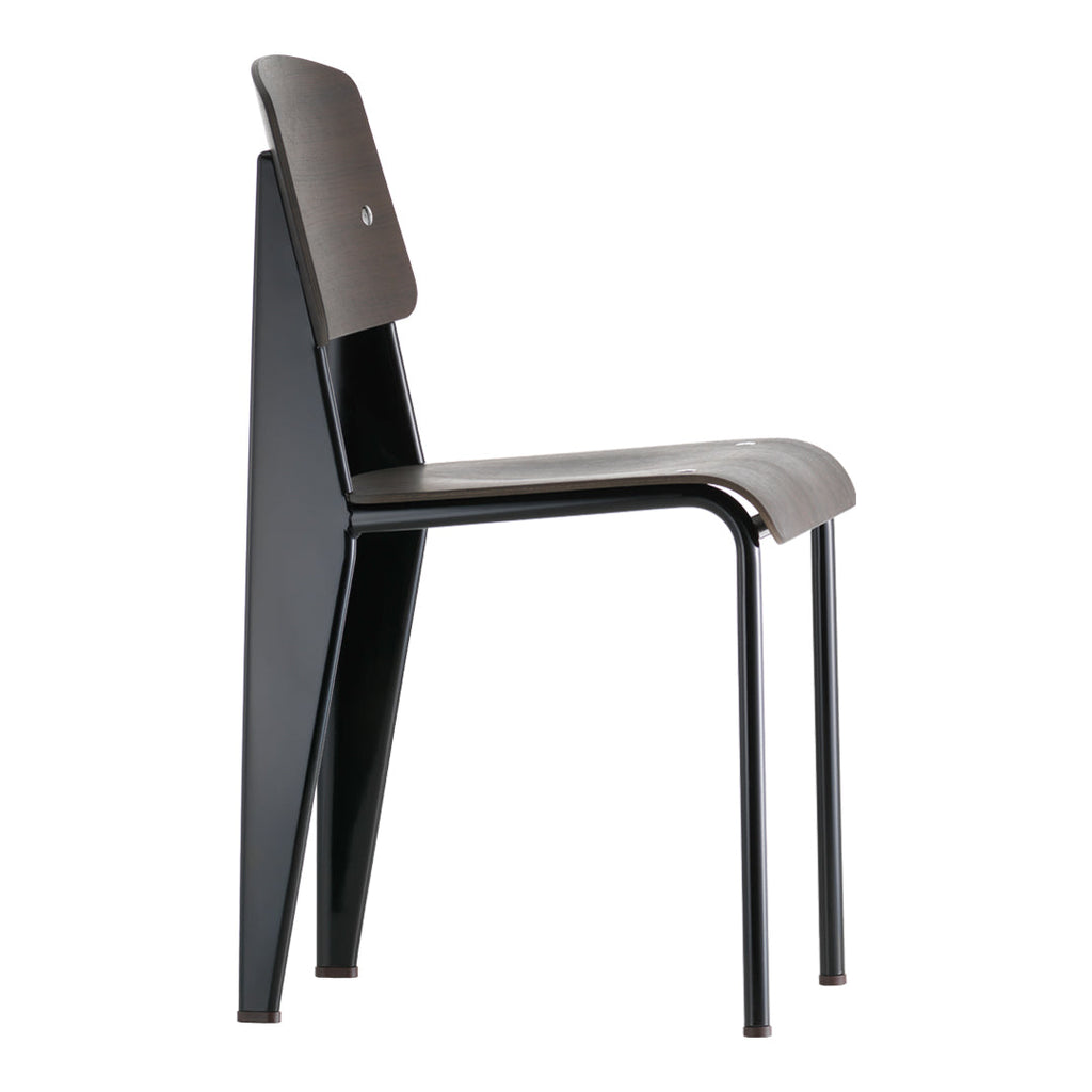 Sedia standard con tubo d'acciaio estetico ingegneristico e legno massello con design strutturale di Jean Prouvé per sala da pranzo