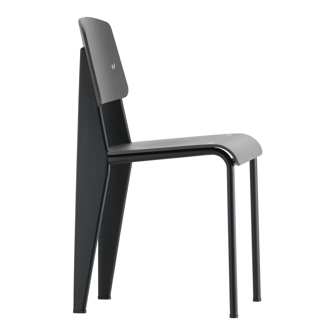 Sedia standard con tubo d'acciaio estetico ingegneristico e legno massello con design strutturale di Jean Prouvé per sala da pranzo