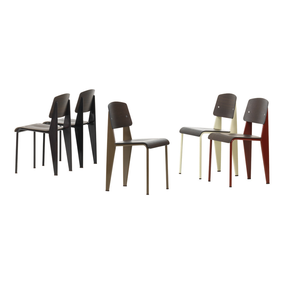 Sedia standard con tubo d'acciaio estetico ingegneristico e legno massello con design strutturale di Jean Prouvé per sala da pranzo