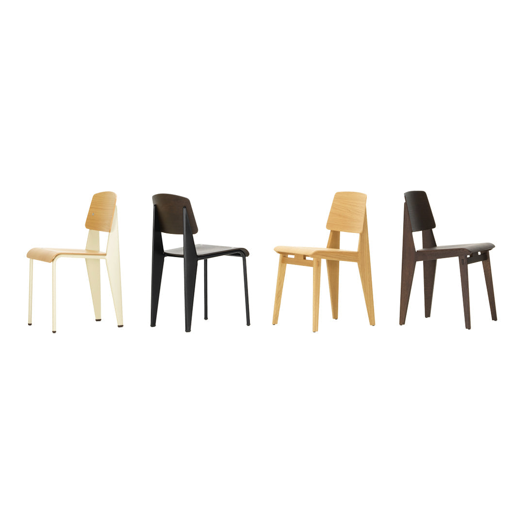 Sedia standard con tubo d'acciaio estetico ingegneristico e legno massello con design strutturale di Jean Prouvé per sala da pranzo