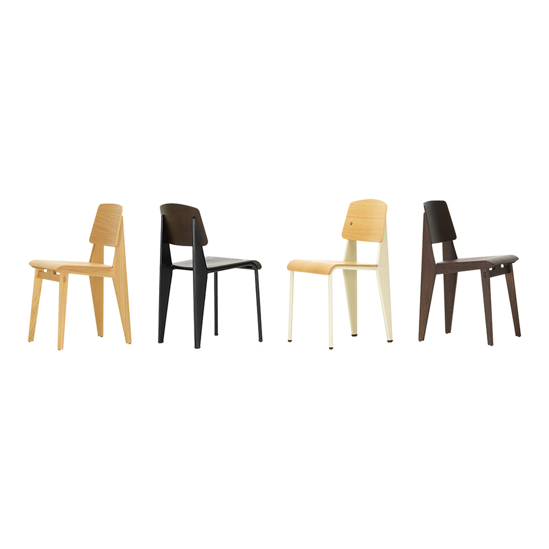 Sedia standard con tubo d'acciaio estetico ingegneristico e legno massello con design strutturale di Jean Prouvé per sala da pranzo