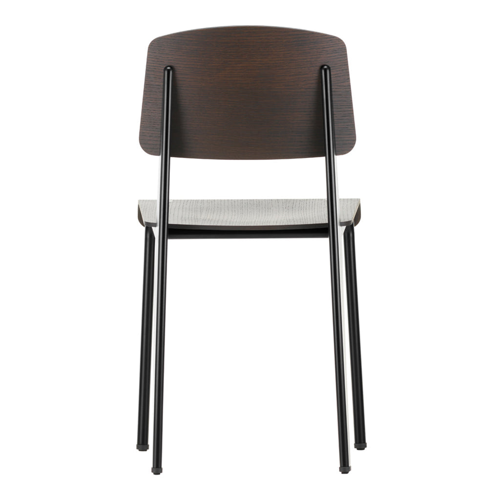 Sedia standard con tubo d'acciaio estetico ingegneristico e legno massello con design strutturale di Jean Prouvé per sala da pranzo