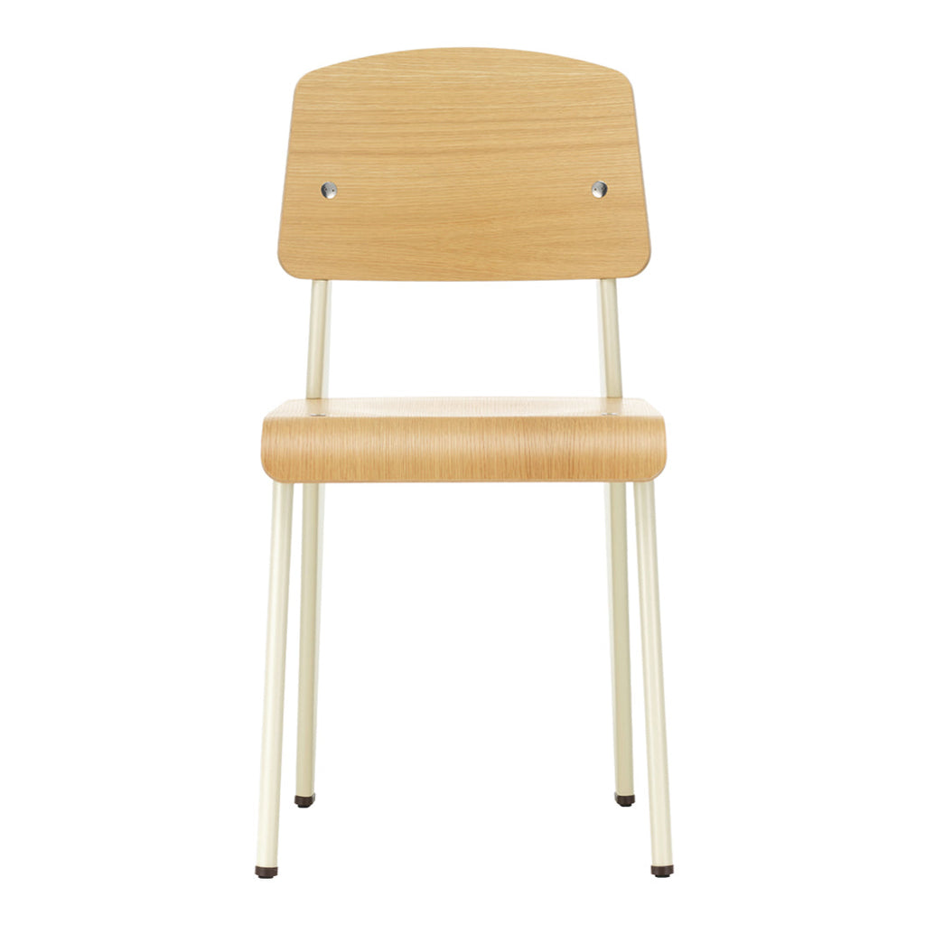 Sedia standard con tubo d'acciaio estetico ingegneristico e legno massello con design strutturale di Jean Prouvé per sala da pranzo
