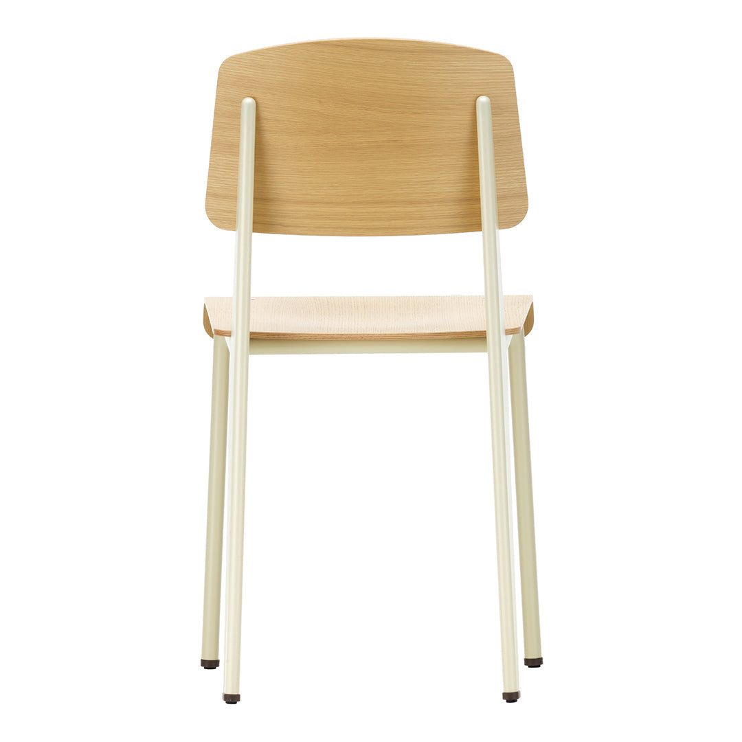 Sedia standard con tubo d'acciaio estetico ingegneristico e legno massello con design strutturale di Jean Prouvé per sala da pranzo