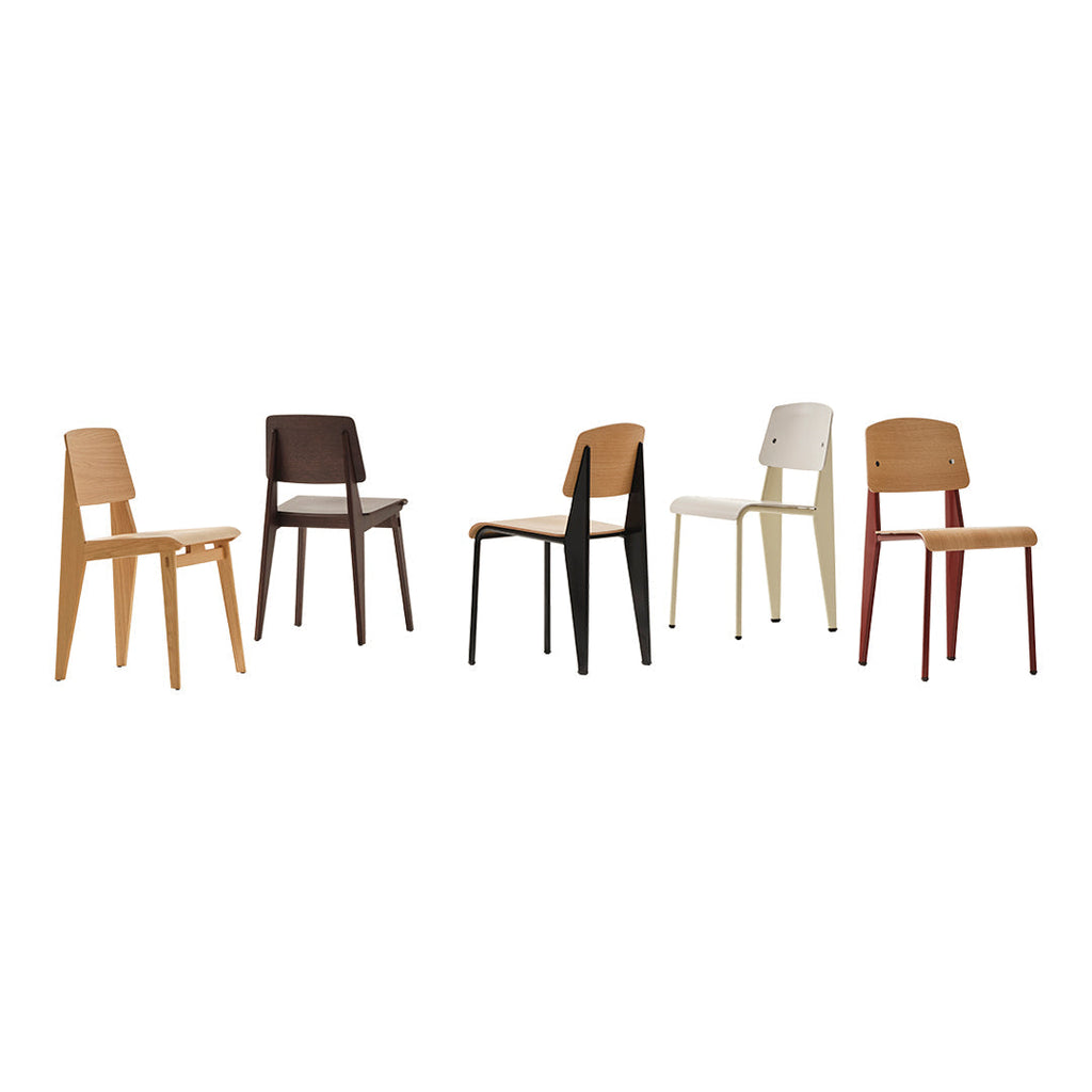 Sedia standard con tubo d'acciaio estetico ingegneristico e legno massello con design strutturale di Jean Prouvé per sala da pranzo