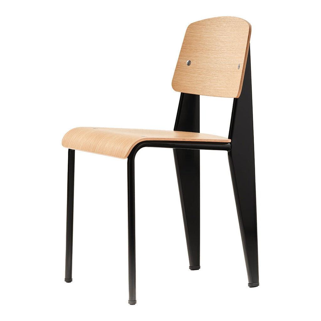 Sedia standard con tubo d'acciaio estetico ingegneristico e legno massello con design strutturale di Jean Prouvé per sala da pranzo