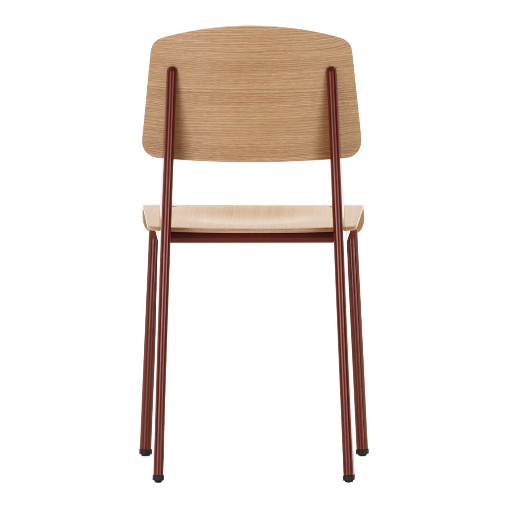 Sedia standard con tubo d'acciaio estetico ingegneristico e legno massello con design strutturale di Jean Prouvé per sala da pranzo