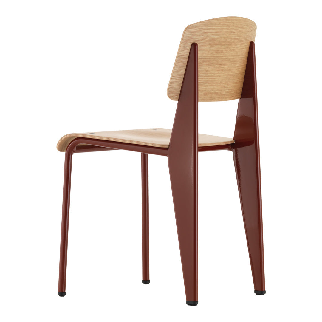 Sedia standard con tubo d'acciaio estetico ingegneristico e legno massello con design strutturale di Jean Prouvé per sala da pranzo