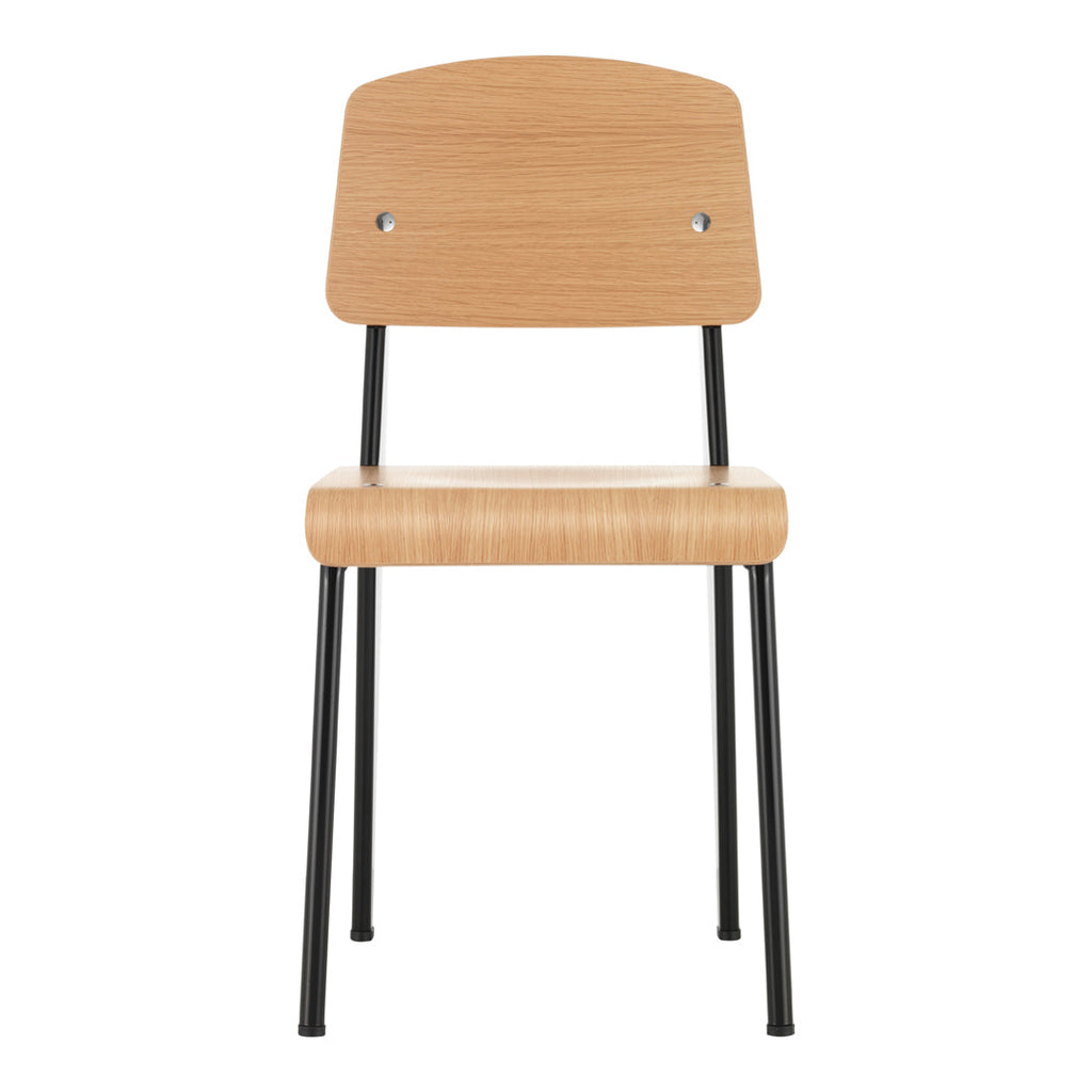 Sedia standard con tubo d'acciaio estetico ingegneristico e legno massello con design strutturale di Jean Prouvé per sala da pranzo