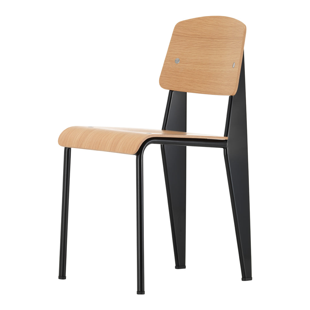 Sedia standard con tubo d'acciaio estetico ingegneristico e legno massello con design strutturale di Jean Prouvé per sala da pranzo