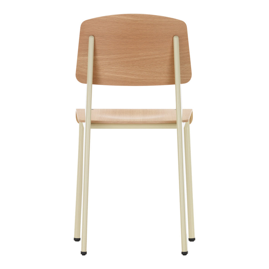 Sedia standard con tubo d'acciaio estetico ingegneristico e legno massello con design strutturale di Jean Prouvé per sala da pranzo