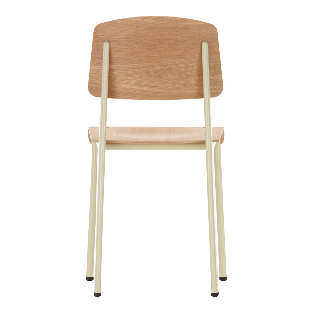 Sedia standard con tubo d'acciaio estetico ingegneristico e legno massello con design strutturale di Jean Prouvé per sala da pranzo