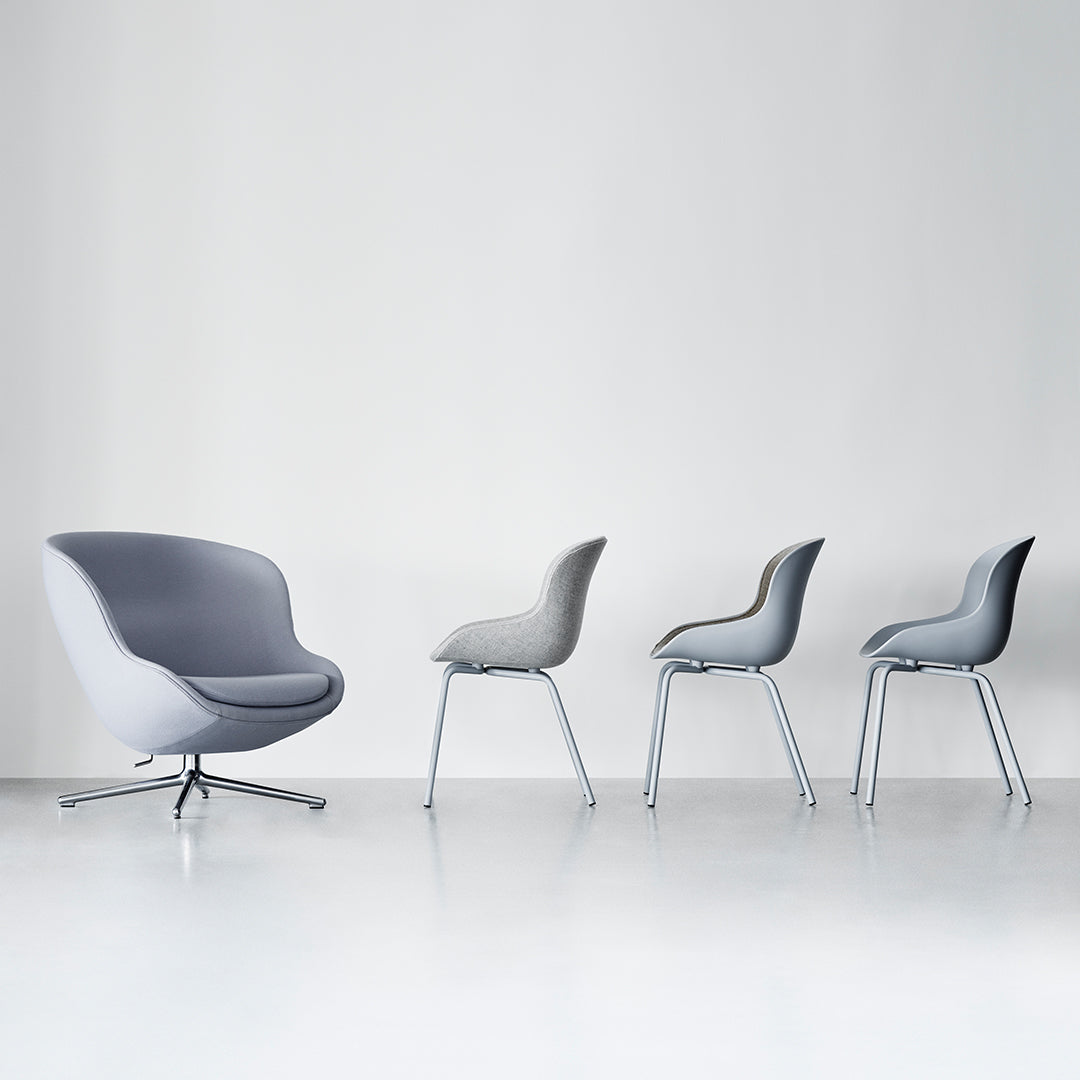 Sedia da pranzo Nordic Hygge imbottita e in acciaio a 4 gambe con curva organica e forma avvolgente per sala da pranzo
