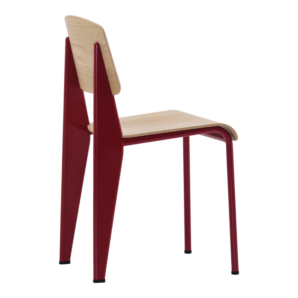 Sedia standard con tubo d'acciaio estetico ingegneristico e legno massello con design strutturale di Jean Prouvé per sala da pranzo