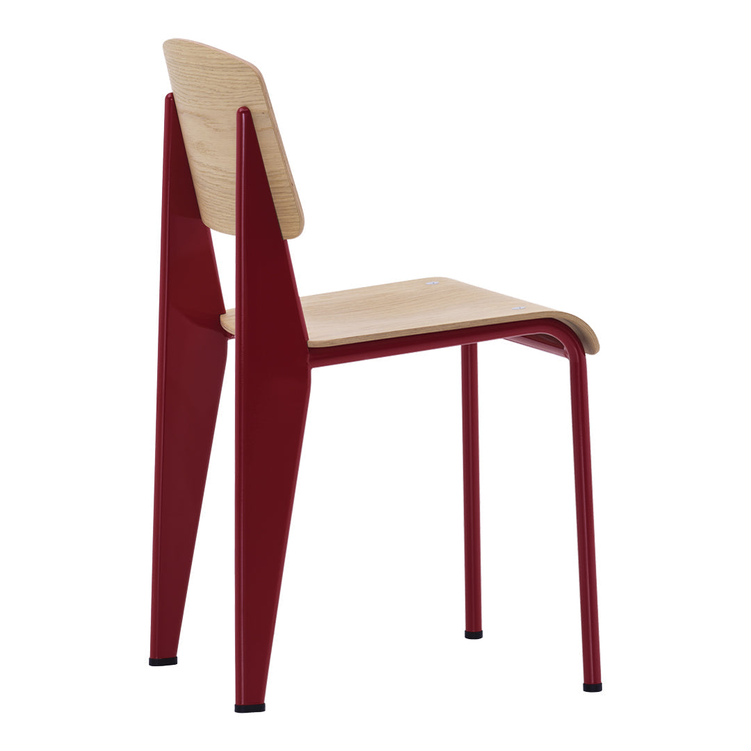 Sedia standard con tubo d'acciaio estetico ingegneristico e legno massello con design strutturale di Jean Prouvé per sala da pranzo