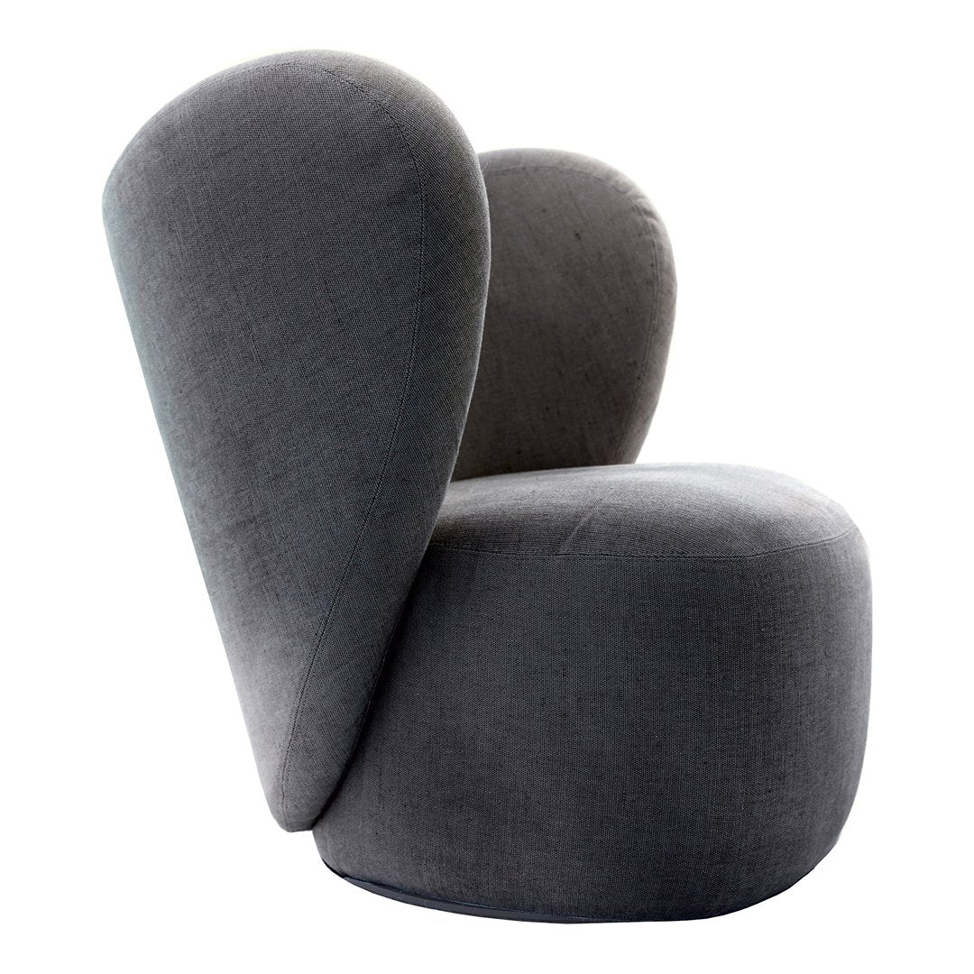 Poltrona lounge girevole imbottita scultorea organica con base girevole a scomparsa per soggiorno