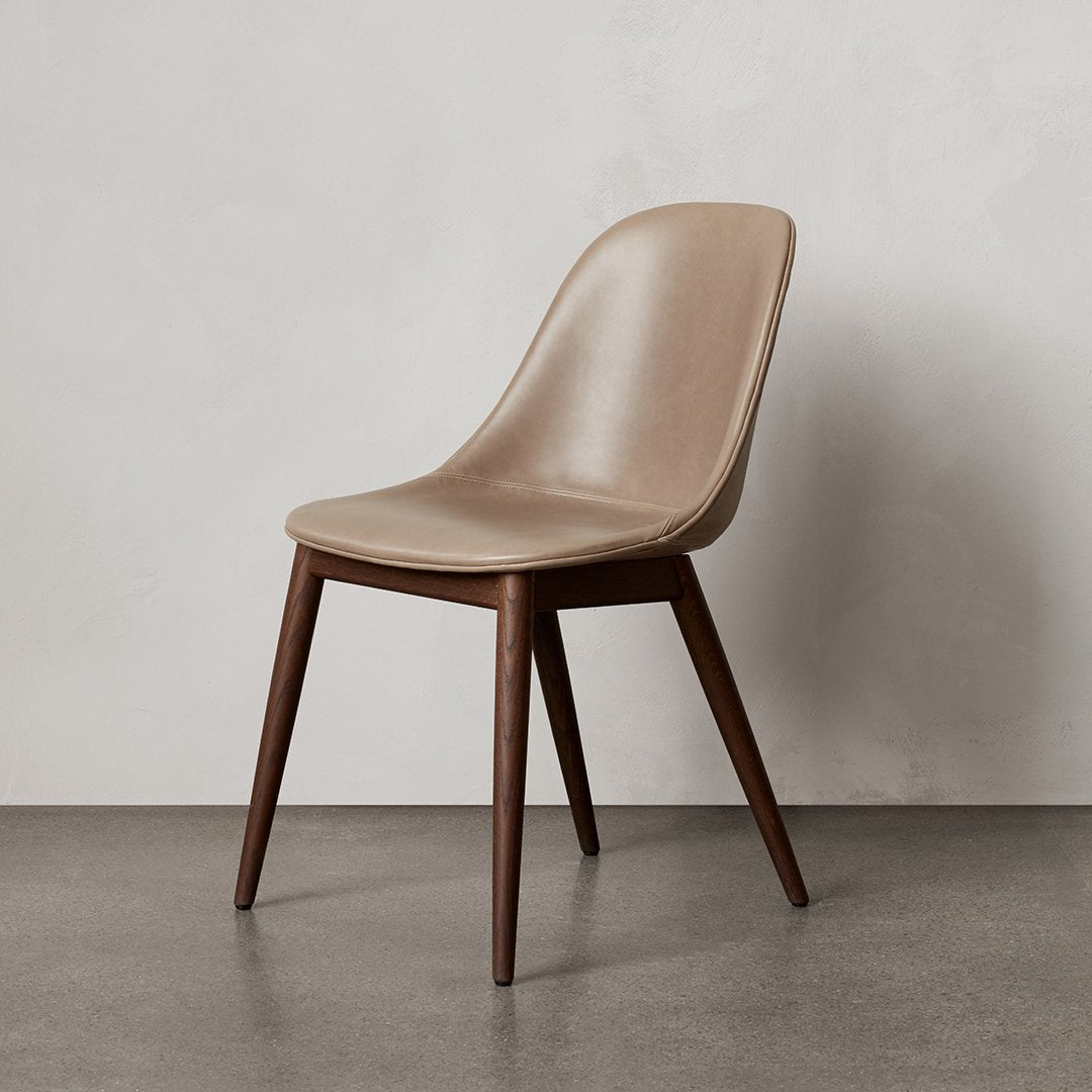 Sedia da pranzo moderna nordica completamente imbottita con braccioli curvati all'esterno e schienale alto per sala da pranzo