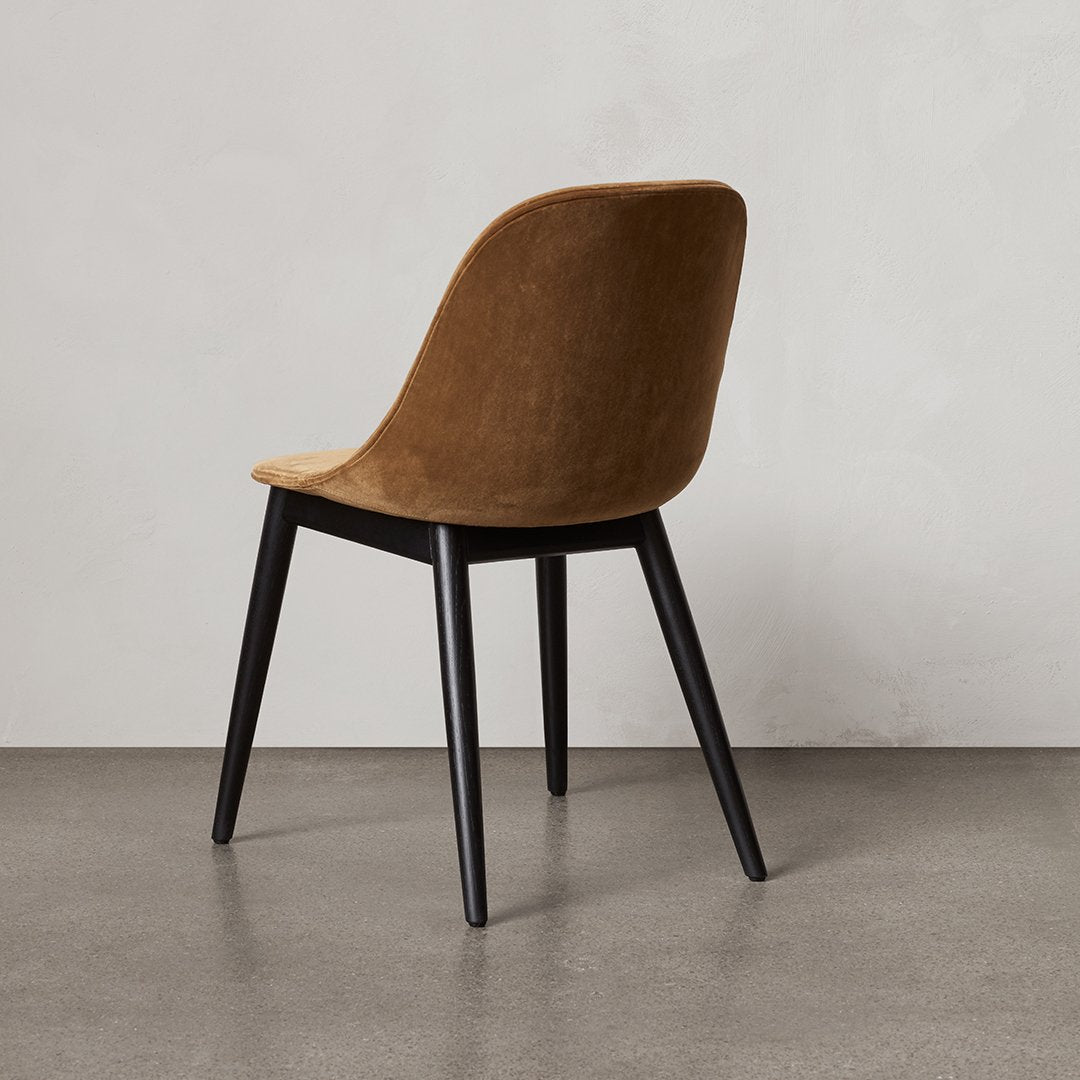 Sedia da pranzo moderna nordica completamente imbottita con braccioli curvati all'esterno e schienale alto per sala da pranzo