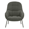 Poltrona lounge moderna e rivestita in tessuto organico con interno ispirato a spicchi di mango, ideale per il soggiorno