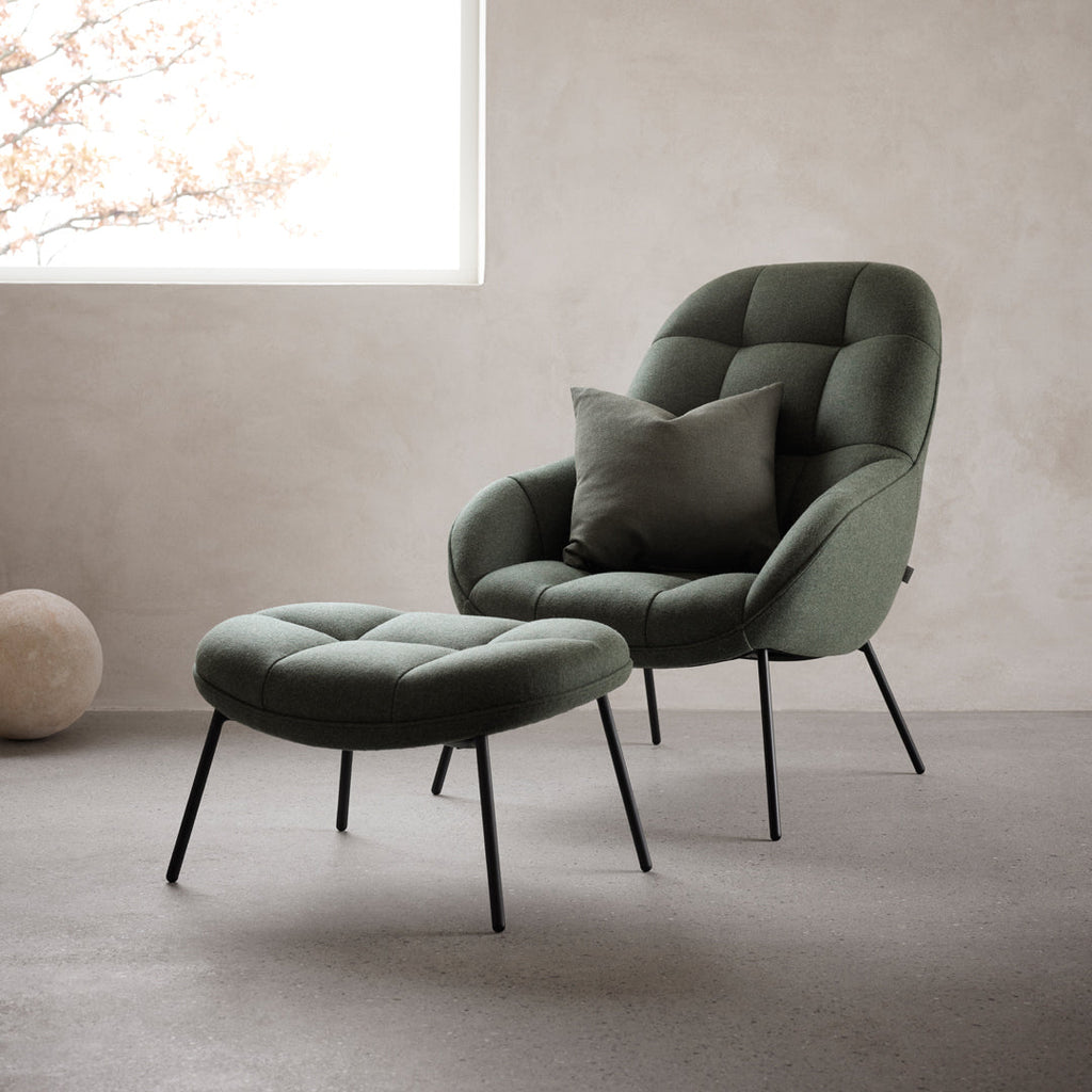 Poltrona lounge moderna e rivestita in tessuto organico con interno ispirato a spicchi di mango, ideale per il soggiorno