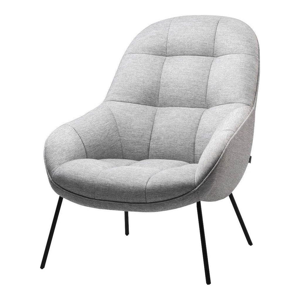 Poltrona lounge moderna e rivestita in tessuto organico con interno ispirato a spicchi di mango, ideale per il soggiorno