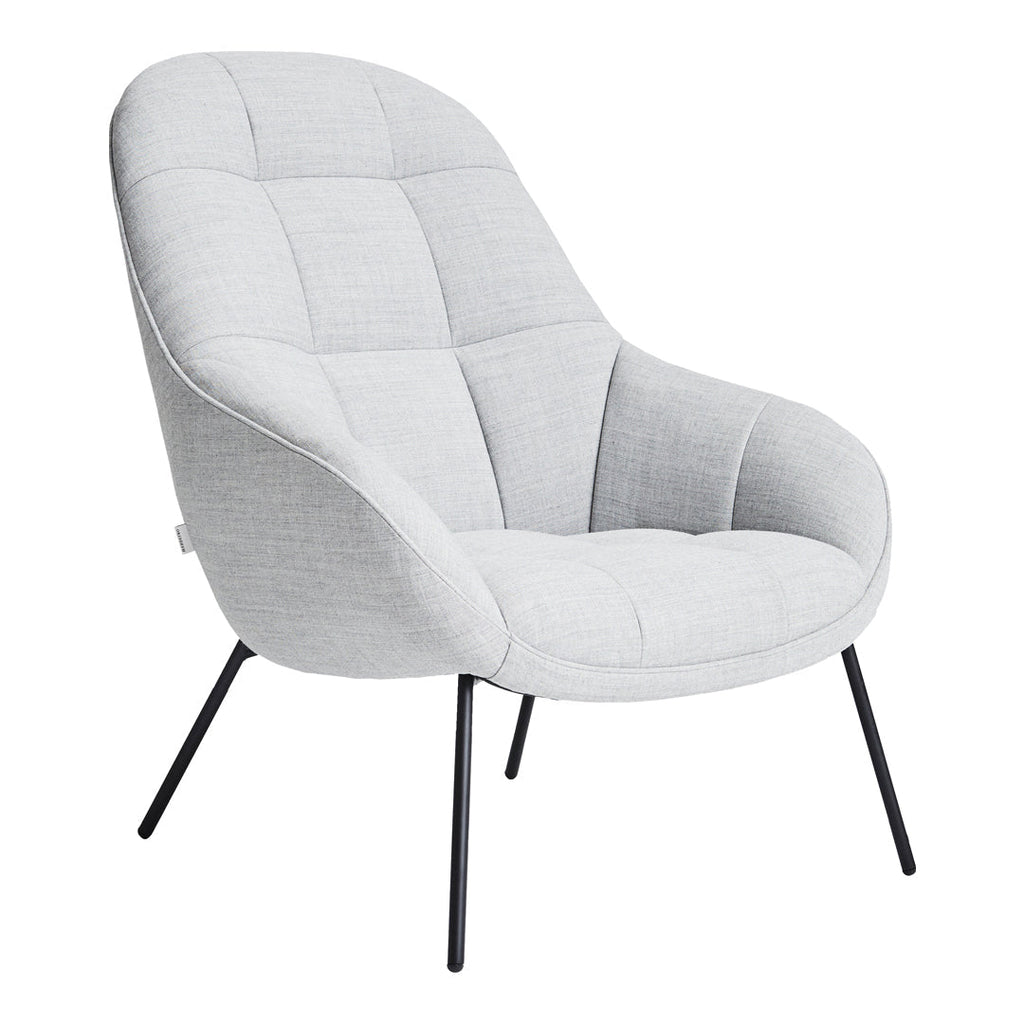 Poltrona lounge moderna e rivestita in tessuto organico con interno ispirato a spicchi di mango, ideale per il soggiorno