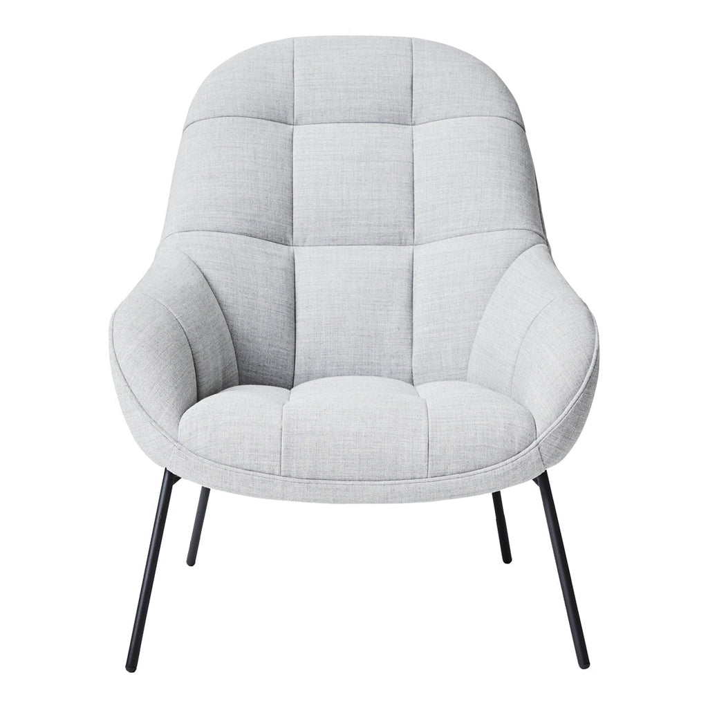 Poltrona lounge moderna e rivestita in tessuto organico con interno ispirato a spicchi di mango, ideale per il soggiorno