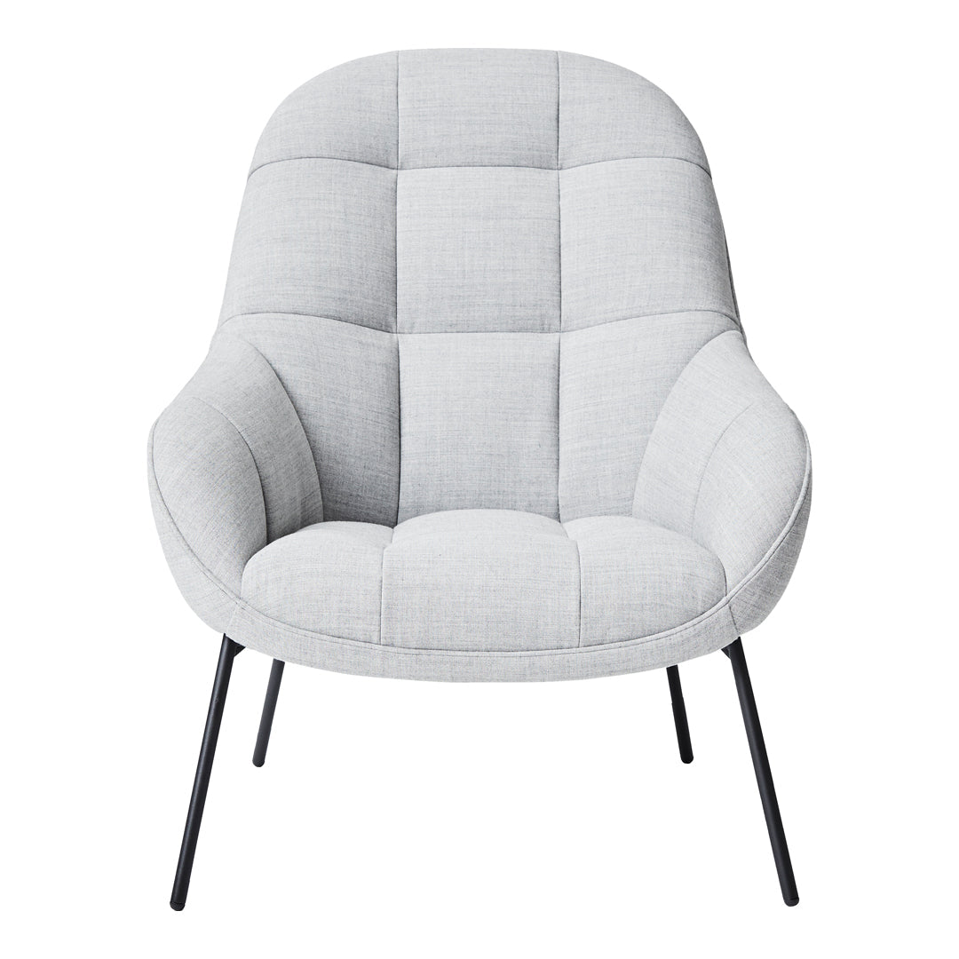 Poltrona lounge moderna e rivestita in tessuto organico con interno ispirato a spicchi di mango, ideale per il soggiorno