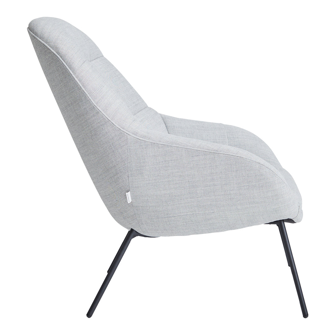 Poltrona lounge moderna e rivestita in tessuto organico con interno ispirato a spicchi di mango, ideale per il soggiorno