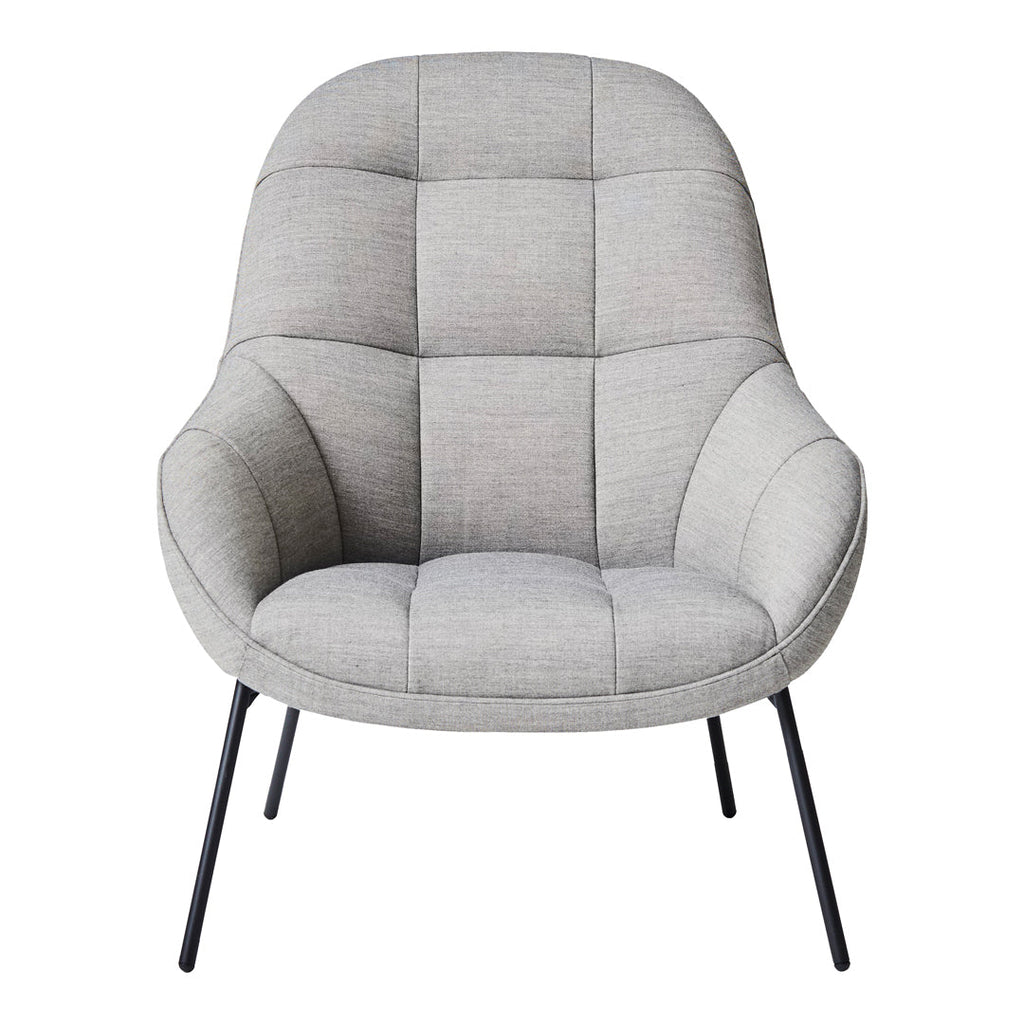 Poltrona lounge moderna e rivestita in tessuto organico con interno ispirato a spicchi di mango, ideale per il soggiorno