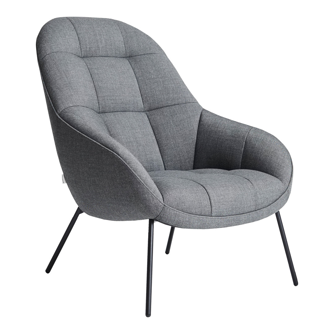 Poltrona lounge moderna e rivestita in tessuto organico con interno ispirato a spicchi di mango, ideale per il soggiorno