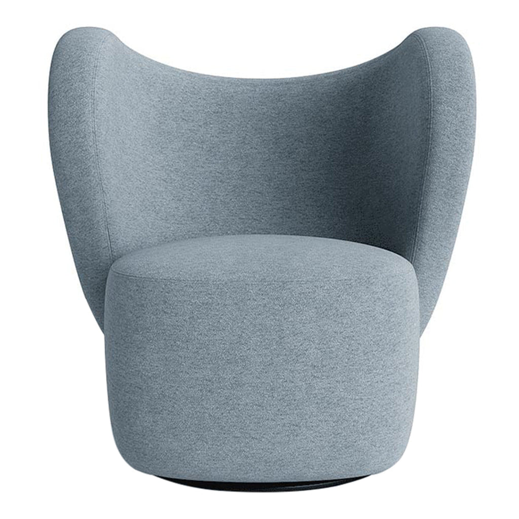 Poltrona lounge girevole imbottita scultorea organica con base girevole a scomparsa per soggiorno