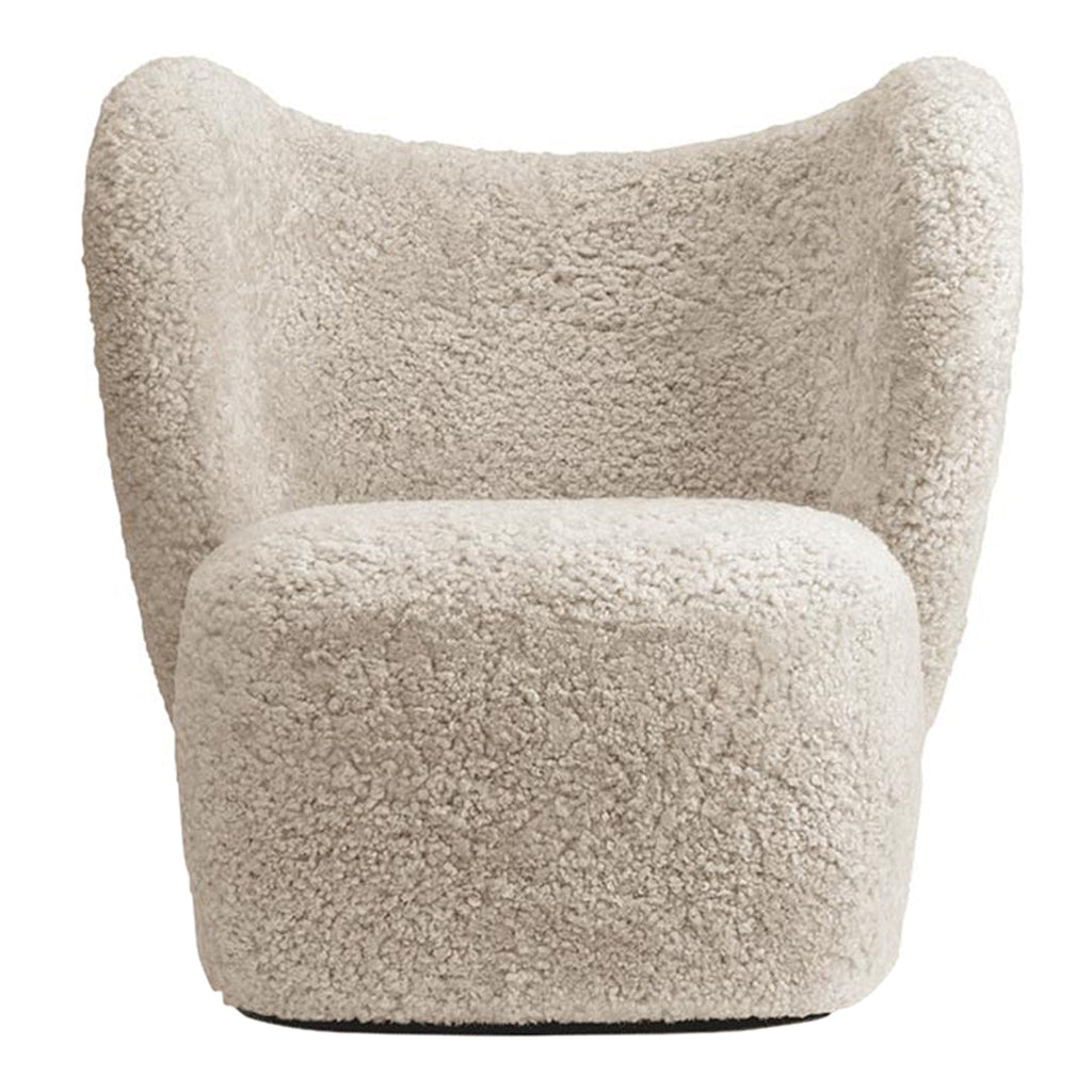 Poltrona lounge girevole imbottita scultorea organica con base girevole a scomparsa per soggiorno