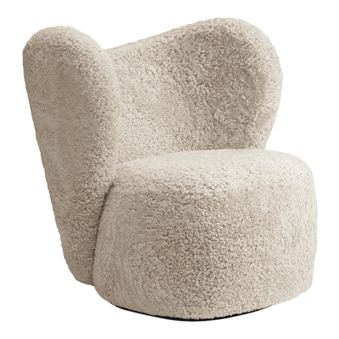 Poltrona lounge girevole imbottita scultorea organica con base girevole a scomparsa per soggiorno