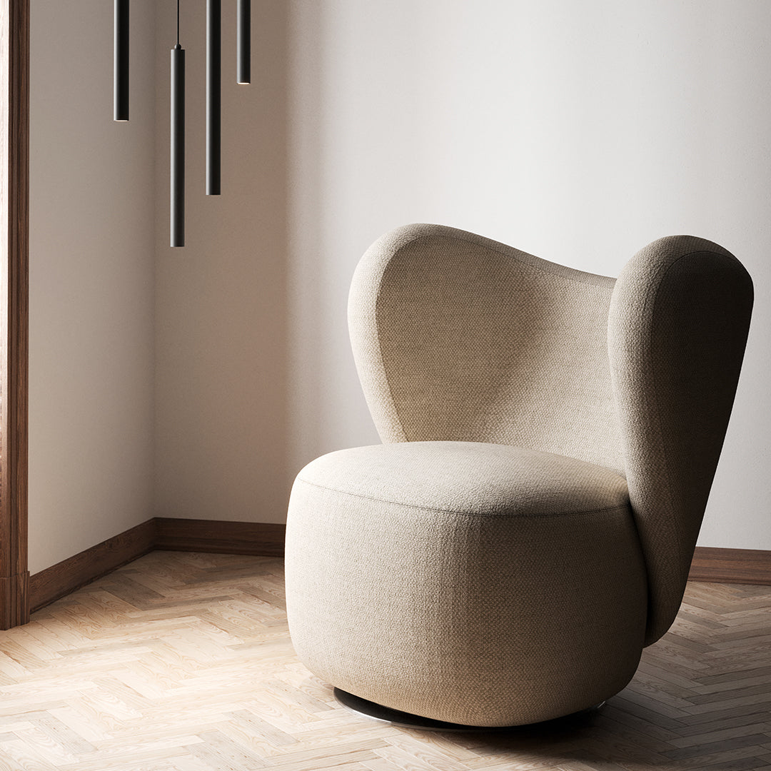 Poltrona lounge girevole imbottita scultorea organica con base girevole a scomparsa per soggiorno