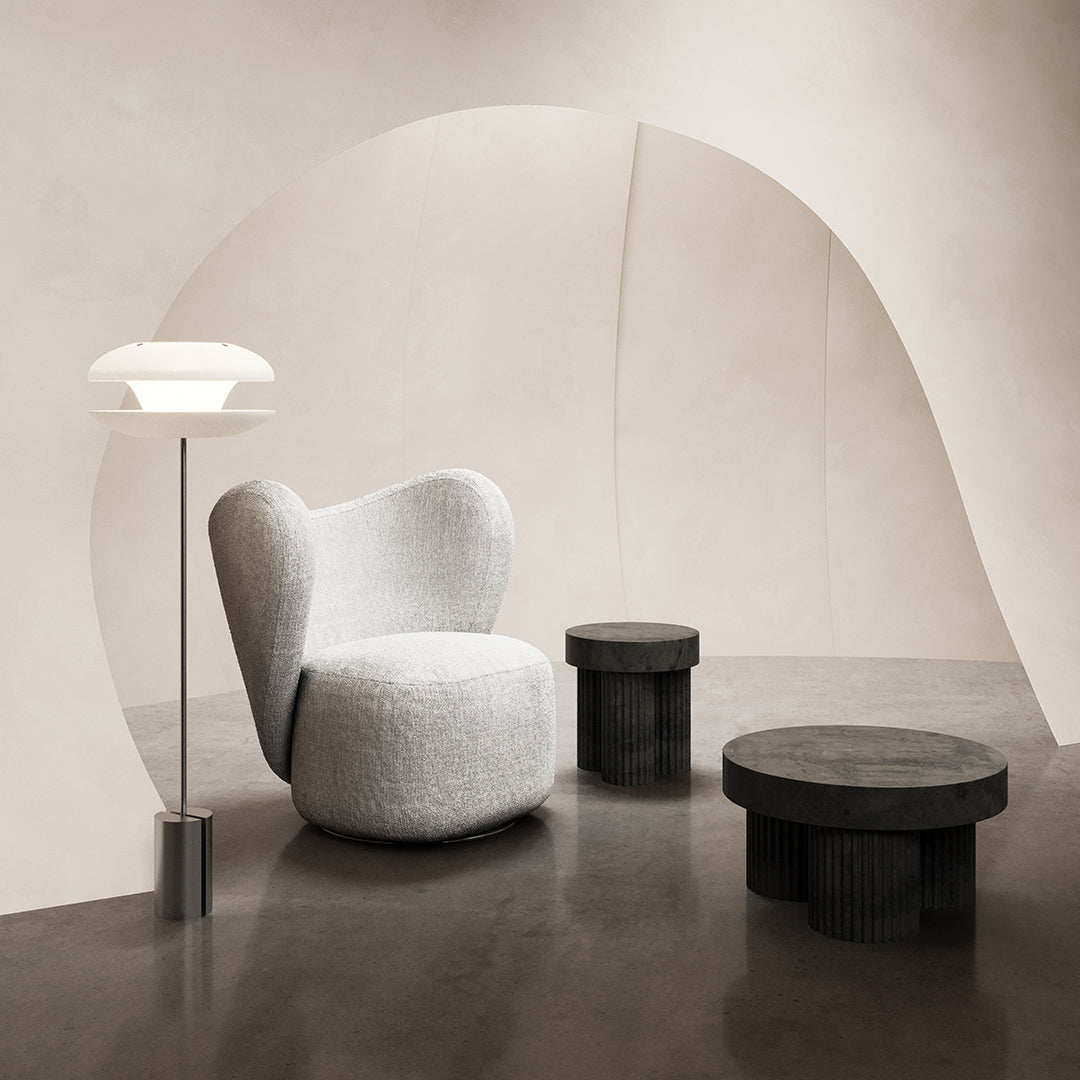 Poltrona lounge girevole imbottita scultorea organica con base girevole a scomparsa per soggiorno
