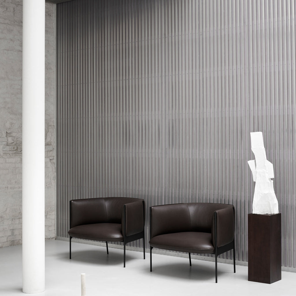 Poltrona lounge di design organico in materiali misti con estetica ispirata ai petali per il soggiorno