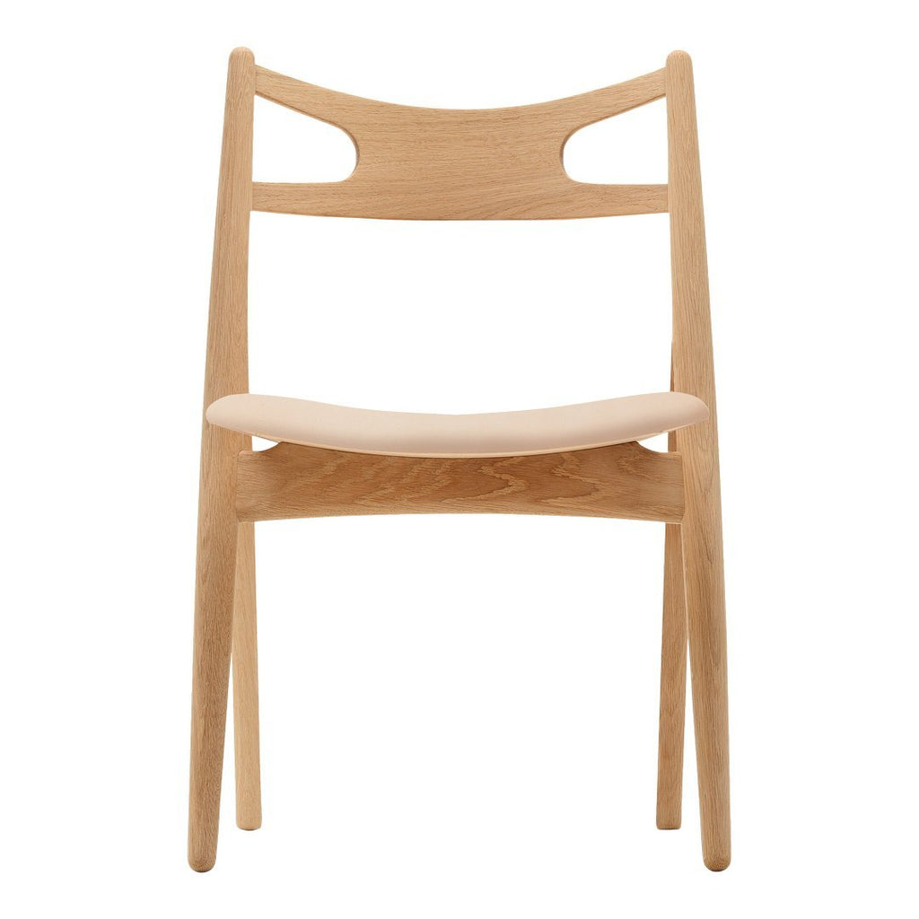 Sedia Sawbuck danese in legno massello artigianale con struttura scultorea a schienale curvo per sala da pranzo