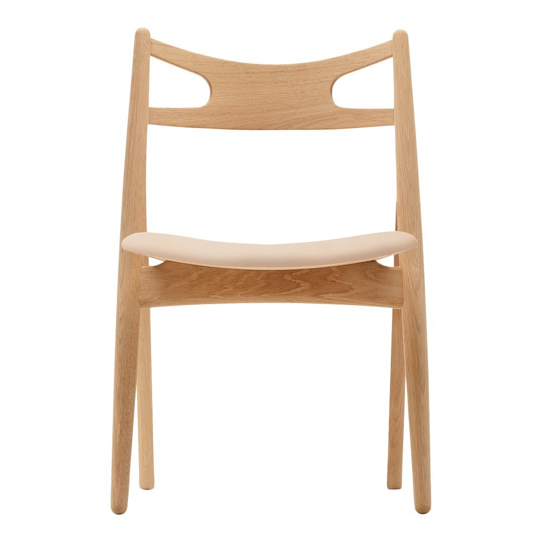 Sedia Sawbuck danese in legno massello artigianale con struttura scultorea a schienale curvo per sala da pranzo