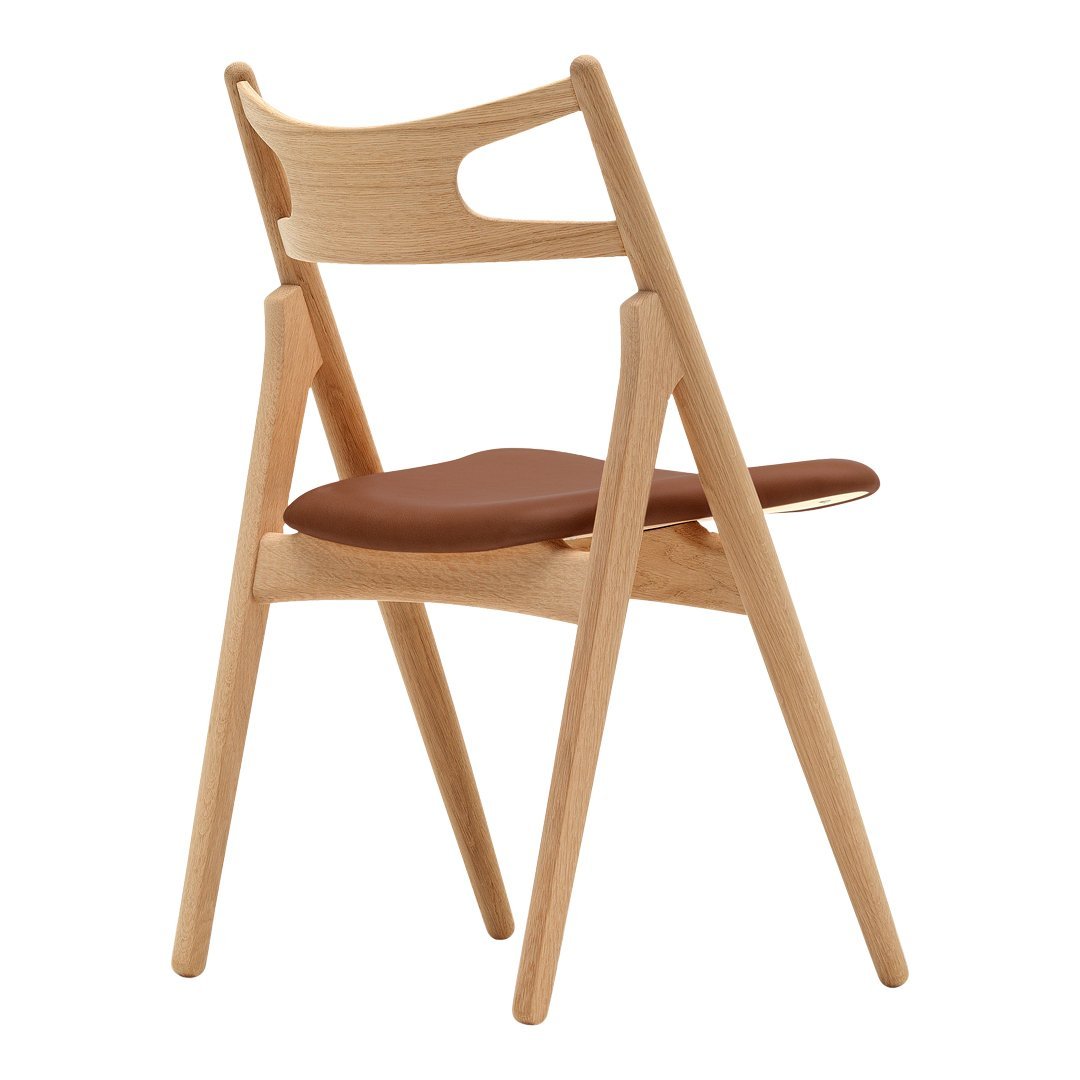 Sedia Sawbuck danese in legno massello artigianale con struttura scultorea a schienale curvo per sala da pranzo