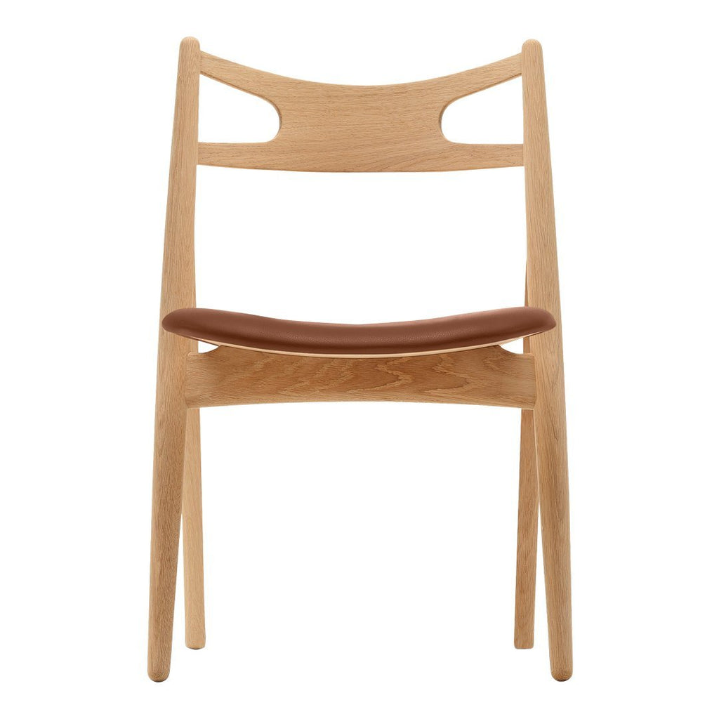 Sedia Sawbuck danese in legno massello artigianale con struttura scultorea a schienale curvo per sala da pranzo