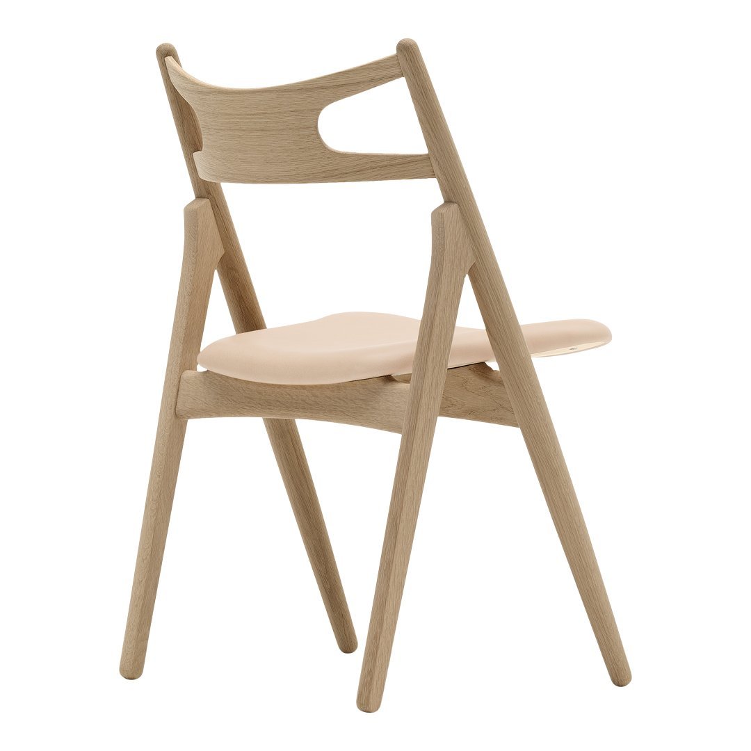 Sedia Sawbuck danese in legno massello artigianale con struttura scultorea a schienale curvo per sala da pranzo
