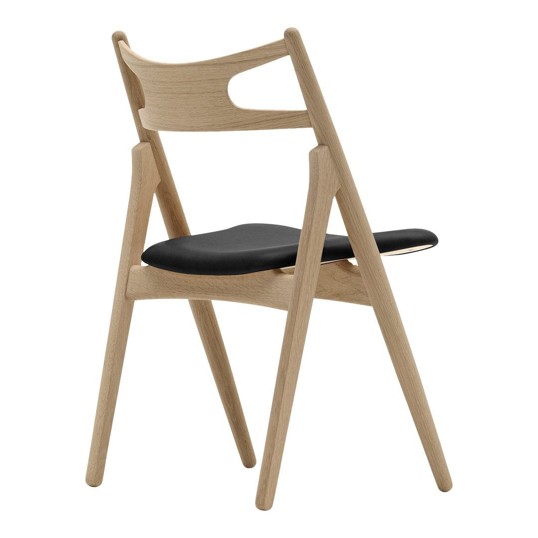 Sedia Sawbuck danese in legno massello artigianale con struttura scultorea a schienale curvo per sala da pranzo