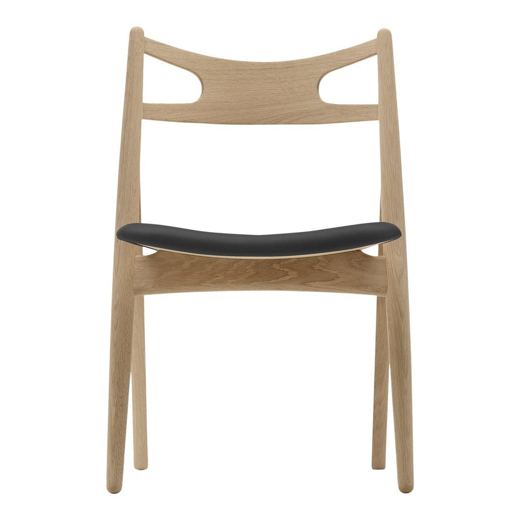 Sedia Sawbuck danese in legno massello artigianale con struttura scultorea a schienale curvo per sala da pranzo