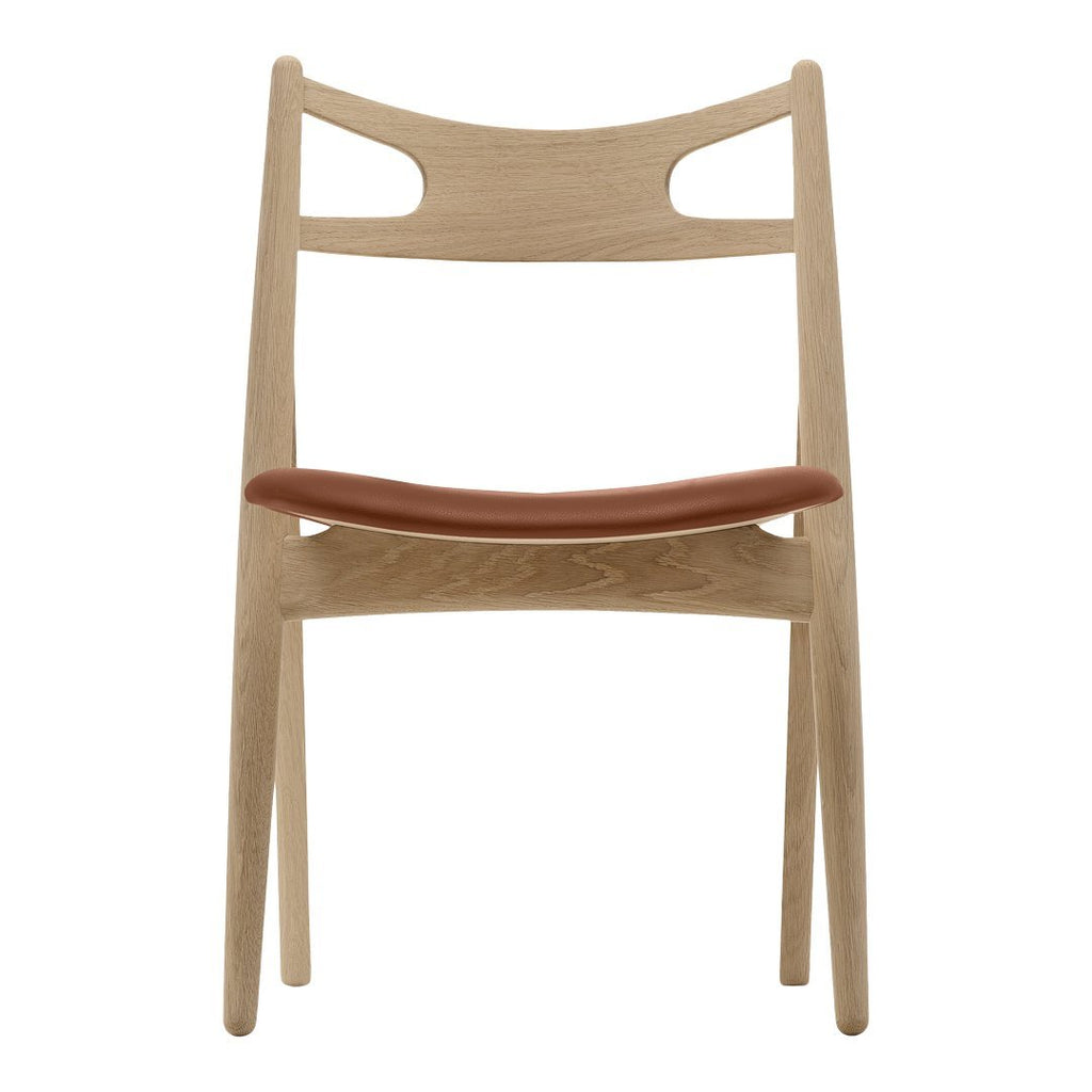 Sedia Sawbuck danese in legno massello artigianale con struttura scultorea a schienale curvo per sala da pranzo