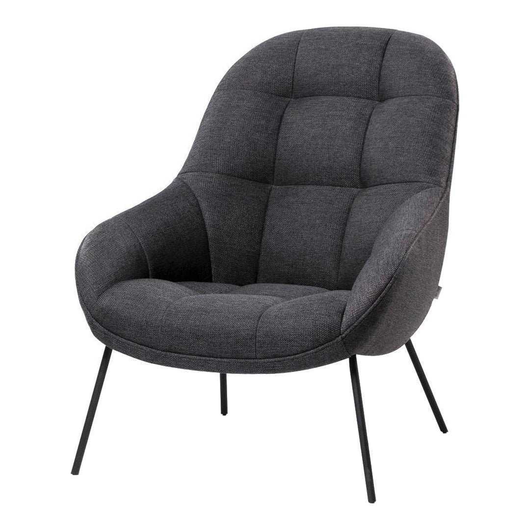 Poltrona lounge moderna e rivestita in tessuto organico con interno ispirato a spicchi di mango, ideale per il soggiorno