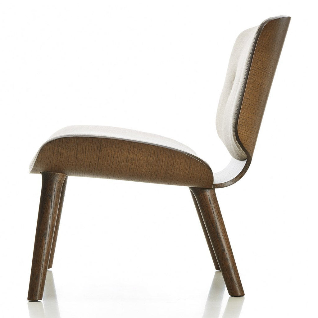 Poltrona da salotto moderna e lussuosa in tessuto fantasia con design avvolgente a perla per soggiorno